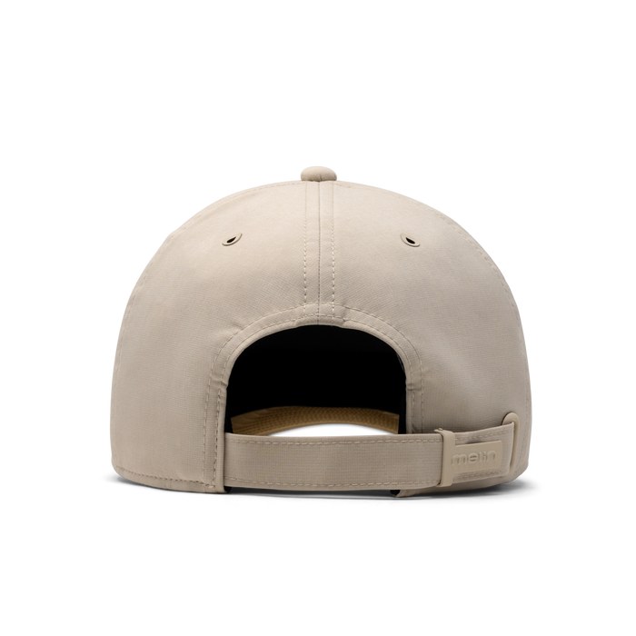 The back view of the melin The Legend Hydro Performance Dad Hat in Sandshell