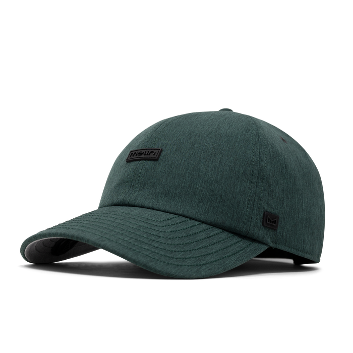 The front, angled view of the melin The Legend Hydro  Performance Dad Hat in Shady Glade Heather