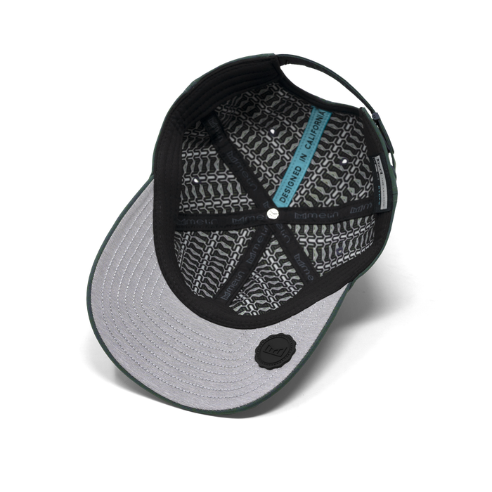 The inside view of the melin The Legend Hydro  Performance Dad Hat in Shady Glade Heather