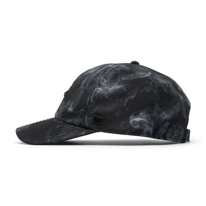 The side view of the melin The Legend Hydro Performance Dad Hat in smoke