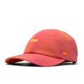 The front, angled view of the melin The Legend Hydro  Performance Dad Hat in Sunset Aura
