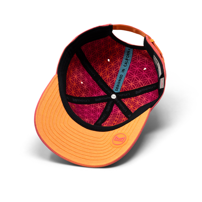The inside view of the melin The Legend Hydro  Performance Dad Hat in Sunset Aura