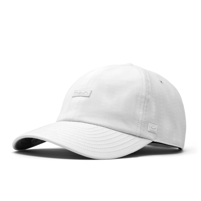 The angled view of the melin The Legend Hydro Performance Dad Hat in white
