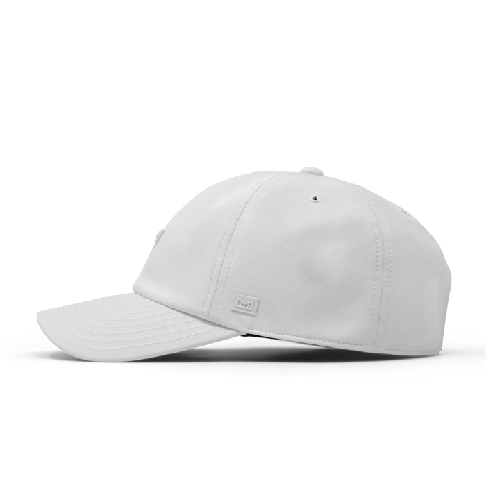 The side view of the melin The Legend Hydro Performance Dad Hat in white