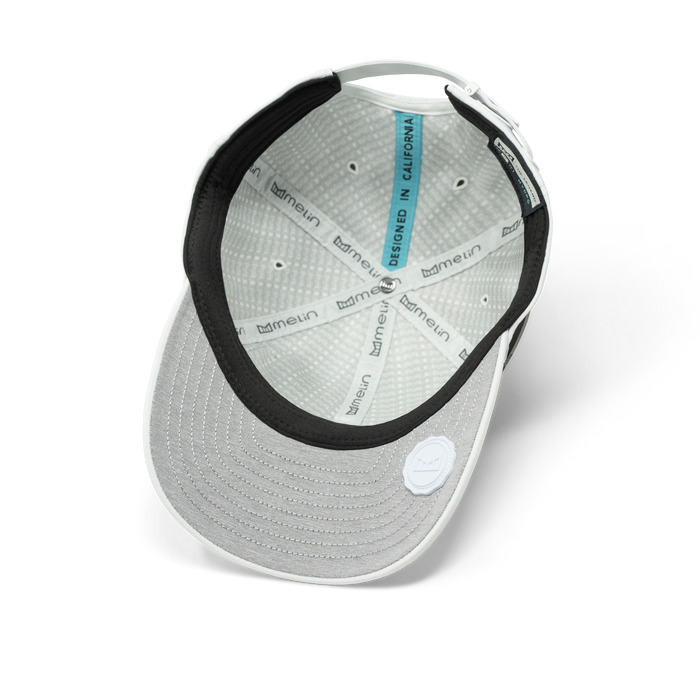 The inside view of the melin The Legend Hydro Performance Dad Hat in white