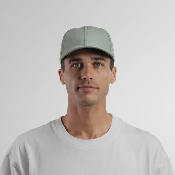 The model-image view of the melin The Legend Mill Little Havana Performance Dad Hat in Mojito Mint