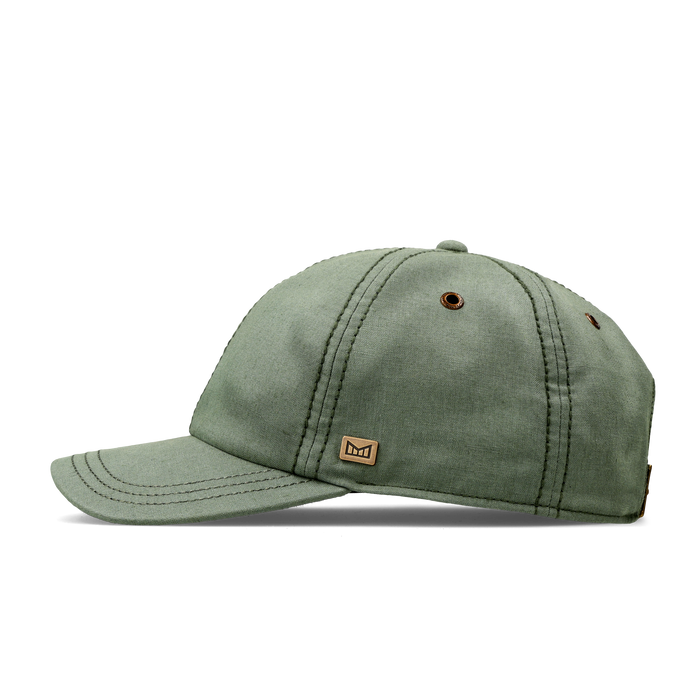 The side view of the melin The Legend Mill Little Havana Performance Dad Hat in mojito mint