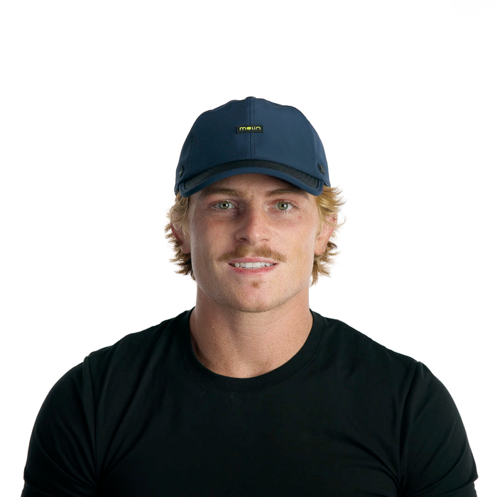 The model-image view of the melin Performance Dad Hat The Legend MPH Hydro in  Black Iris / Black