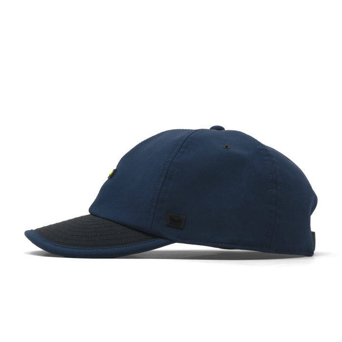 The side view of the melin Performance Dad Hat The Legend MPH Hydro in  Black Iris / Black