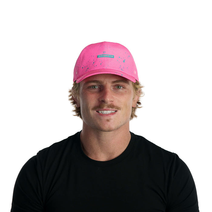 The model-image view of the melin Performance Dad Hat The Legend Neon Hydro  in  Hot Pink