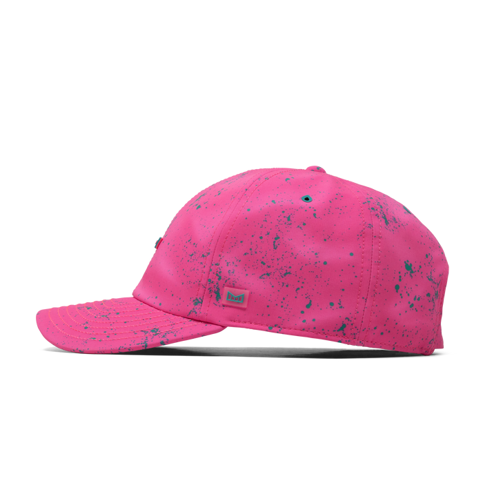 The side view of the melin The Legend Neon Hydro Performance Dad Hat in hot pink