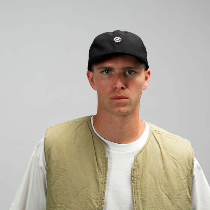 The model-image of the Melin Vintage Fit Legend Packable Hydro hat in Black