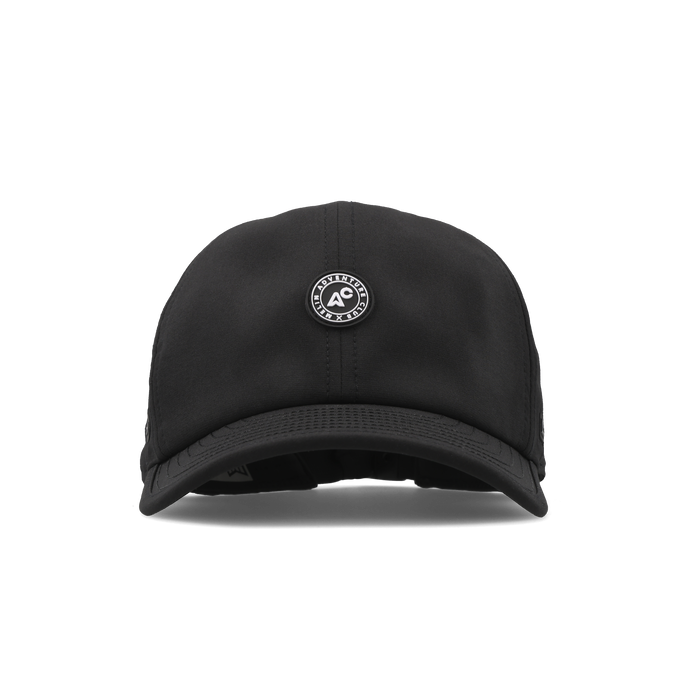 The frontal view of the melin The Legend Packable Hydro Performance Dad Hat in black