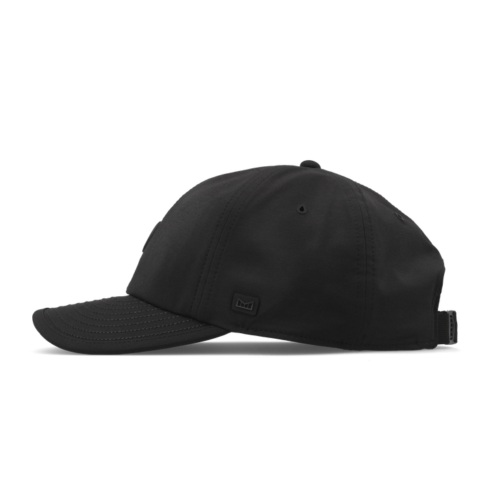 The side view of the melin The Legend Packable Hydro Performance Dad Hat in black