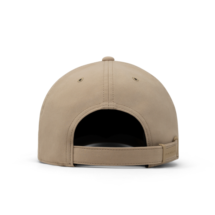 The back view of the melin The Legend Packable Hydro  Performance Dad Hat in  Sand