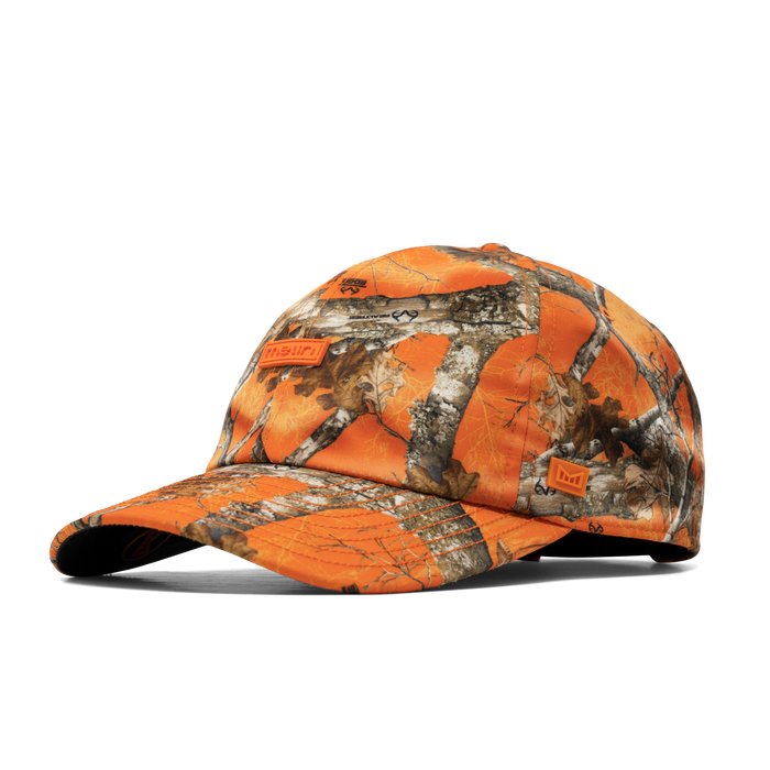 The angled view of the melin The Legend Realtree Hydro Performance Dad Hat in neo camo