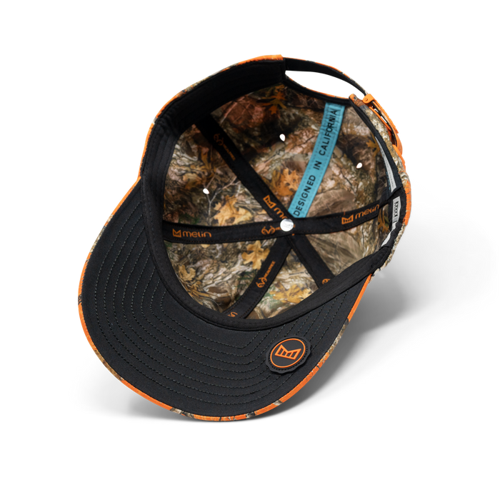 The inside view of the melin The Legend Realtree Hydro Performance Dad Hat in neo camo