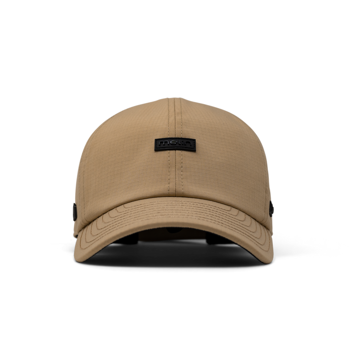 The front view of the melin The Legend Thermal  Performance Dad Hat in Khaki
