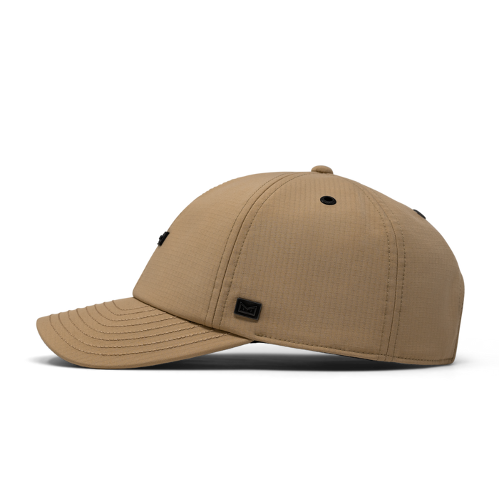 The side view of the melin The Legend Thermal  Performance Dad Hat in Khaki