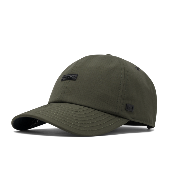 The front, angled view of the melin The Legend Thermal  Performance Dad Hat in Military