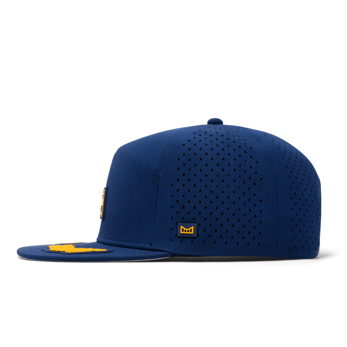 The side view of the melin Trenches Captains Hydro  Horizon Fit in  Navy