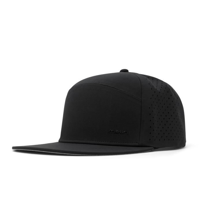 The front, angled view of melin's Trenches Hydrolite snapback hat in Black
