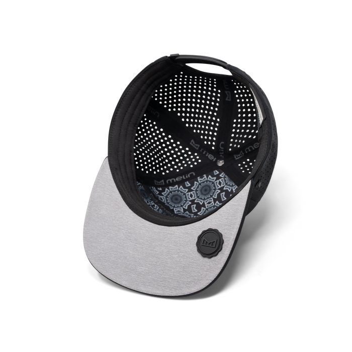 The inside view of melin's Trenches Hydrolite snapback hat in Black