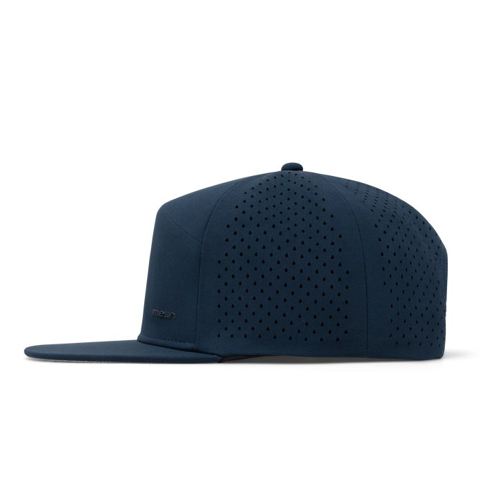 The side view of the melin Trenches Hydrolite  Horizon Fit in  Navy
