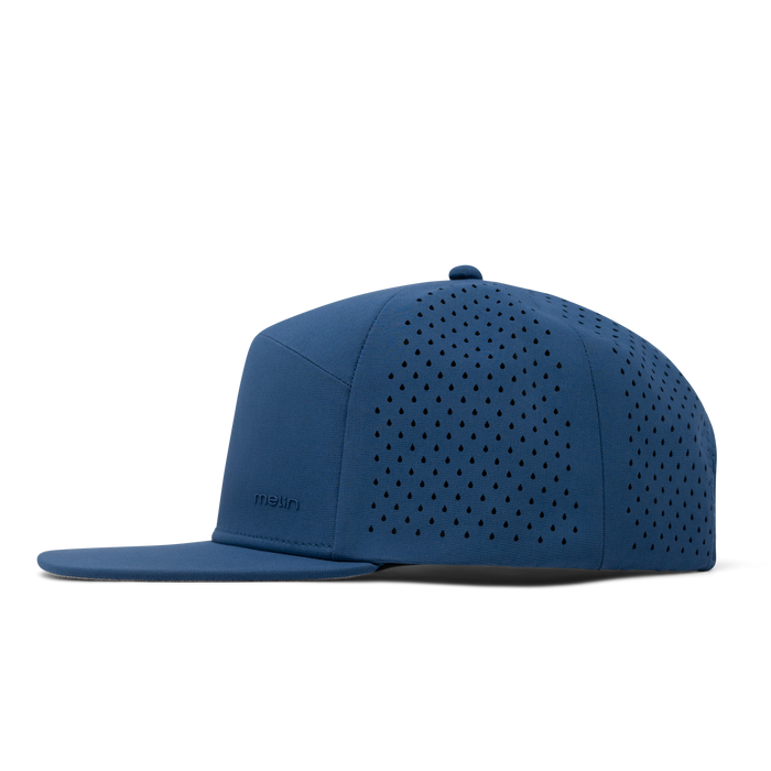 The side view of melin's Trenches Hydrolite snapback hat in Steel Blue