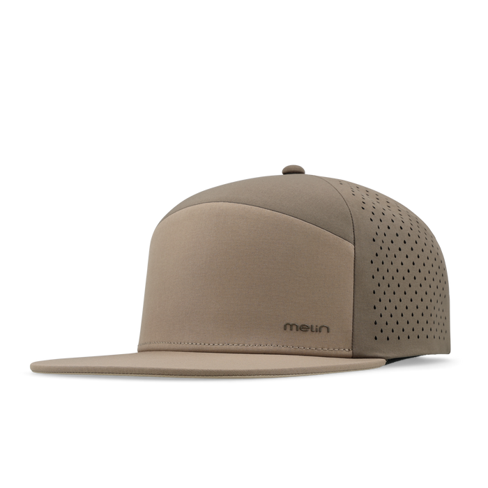 The angled view of the melin Horizon Fit Trenches Hydrolite hat in teak