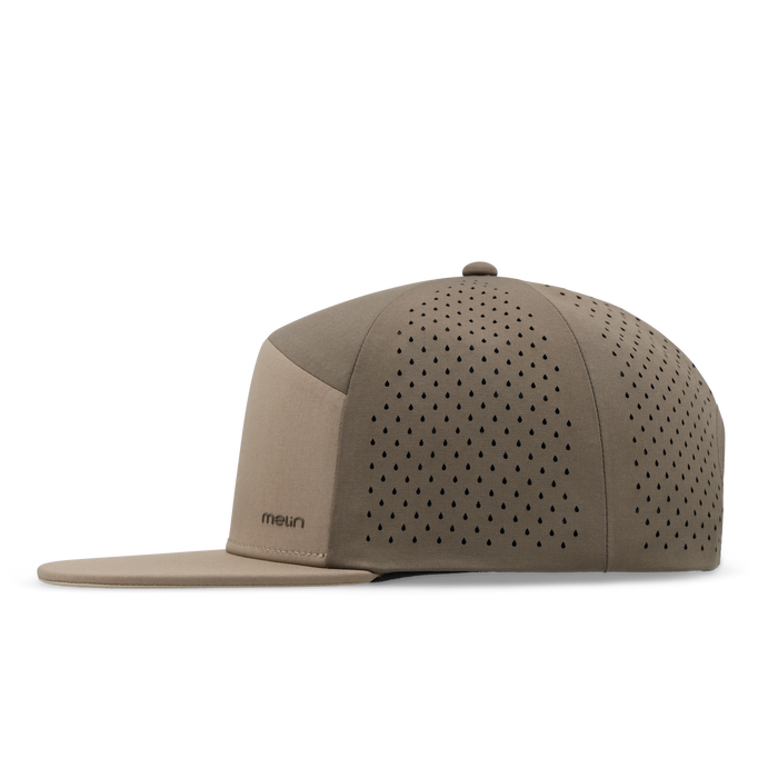 The side view of the melin Horizon Fit Trenches Hydrolite hat in teak