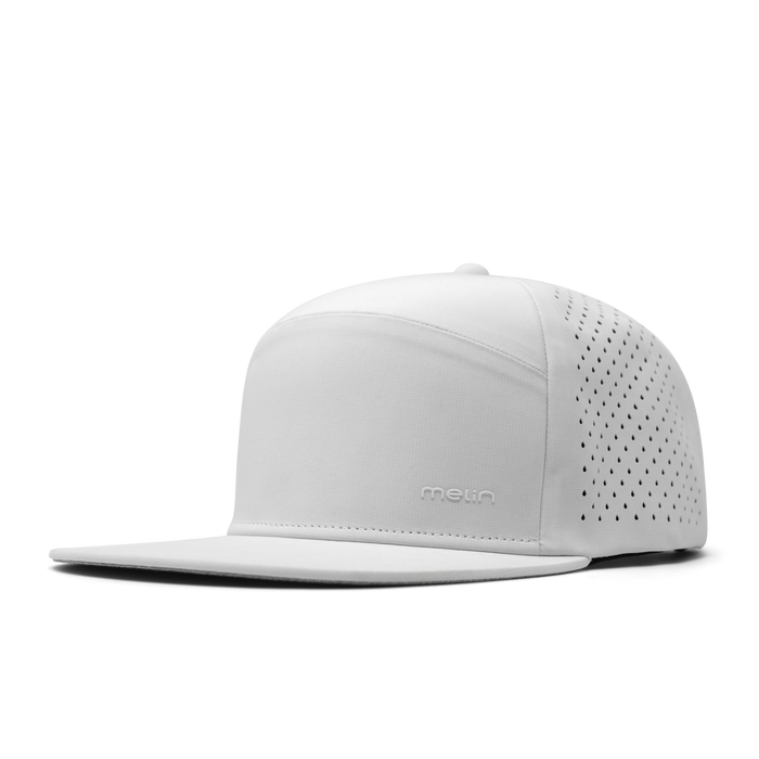 The front, angled view of melin's Trenches Hydrolite snapback hat in White