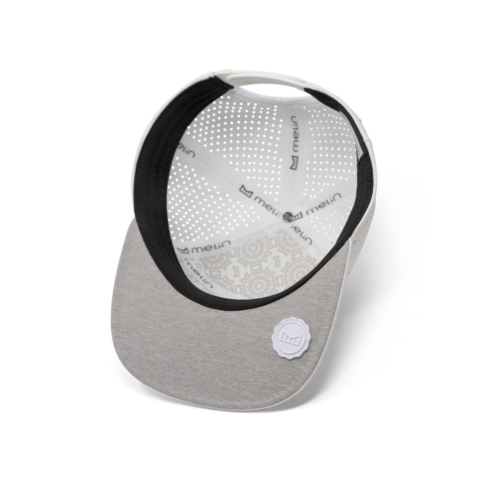 The inside view of melin's Trenches Hydrolite snapback hat in White