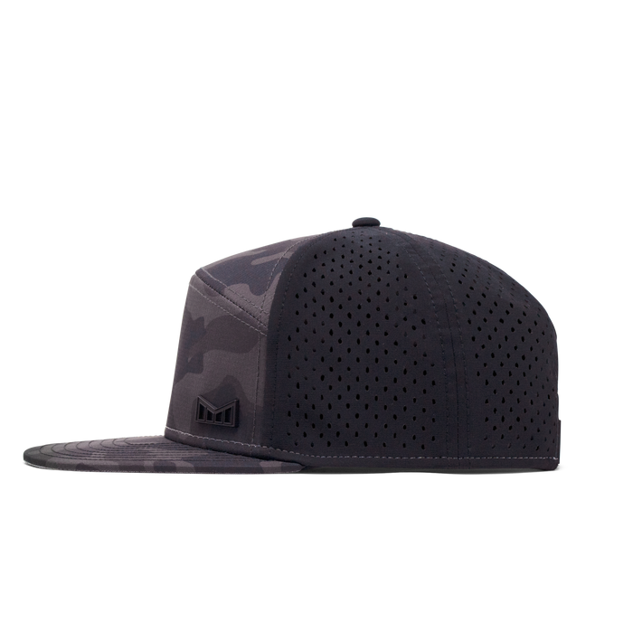 The side view of the Melin Horizon Fit Treches Icon Hydro hat in black camo