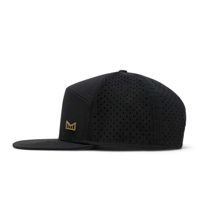 The side view of melin's Trenches Icon Hydro - Black / Gum