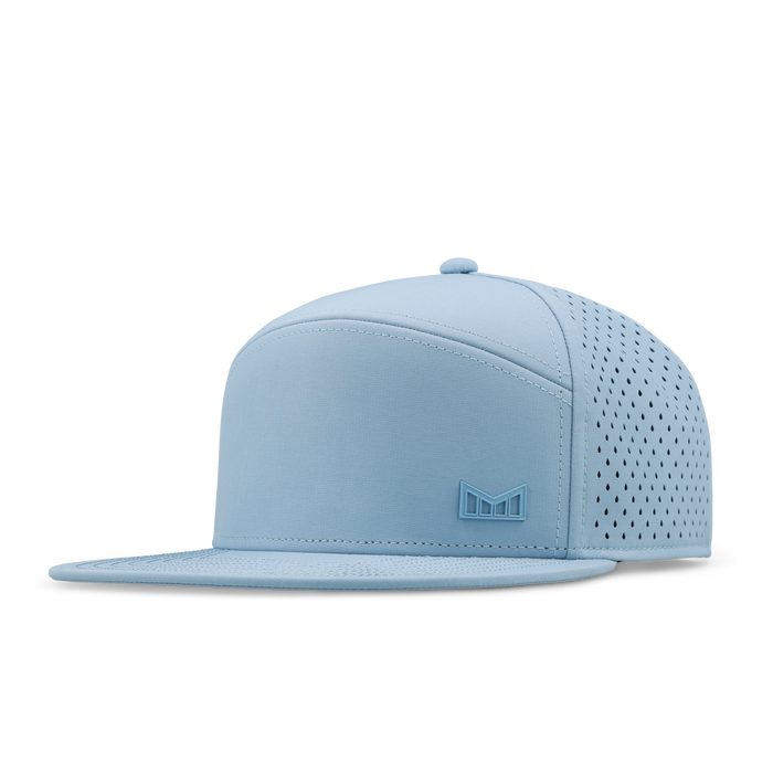 The front, angled view of the melin Trenches Icon Hydro  Horizon Fit in  Cashmere Blue