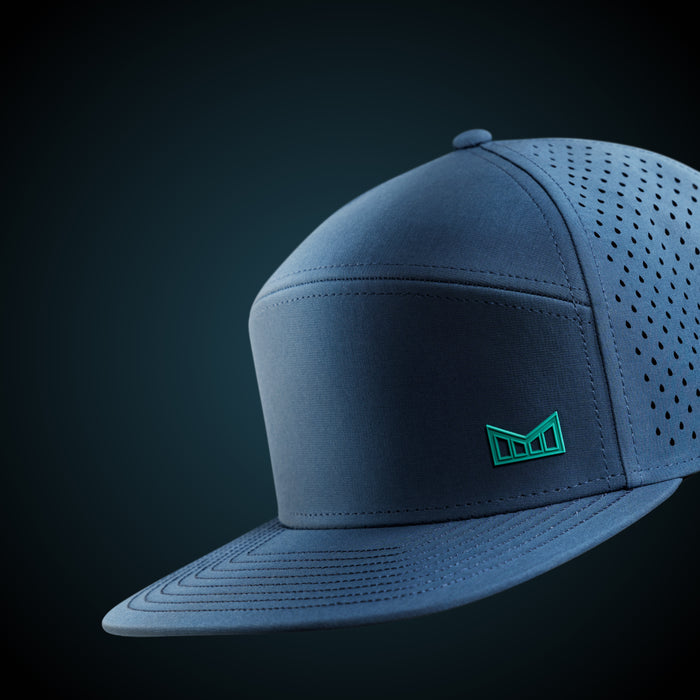 The front, angled studio view of the melin Horizon Fit Trenches Icon Hydro in Deep Dive