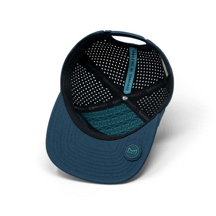 The inside view of the melin Horizon Fit Trenches Icon Hydro in Deep Dive