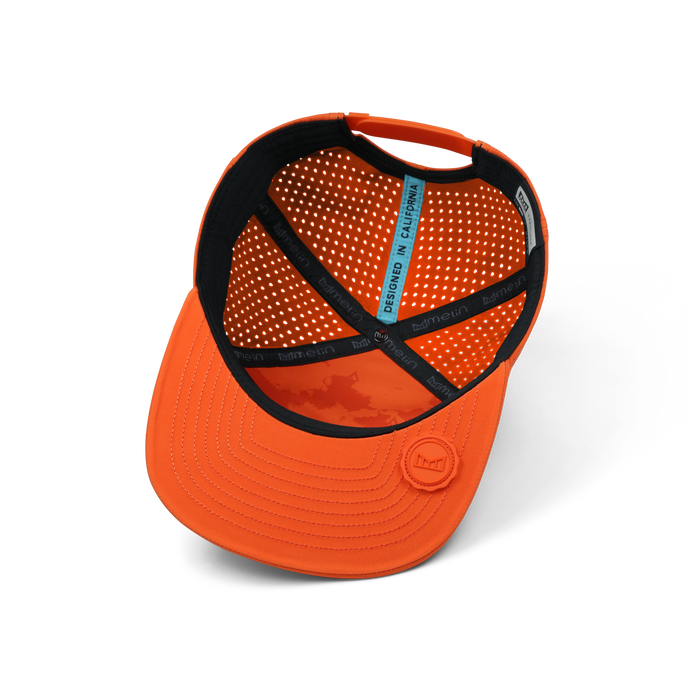 Orange baseball cap with black and perforated orange interior, adjustable back straps, and embroidered logo on front.