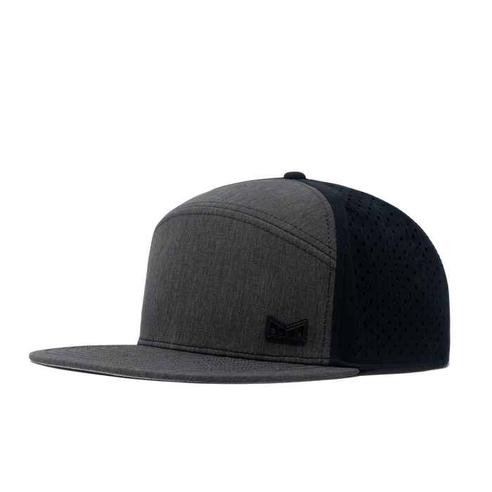 The angled view of the Melin Horizon Fit Trenches Icon Hydro hat in black