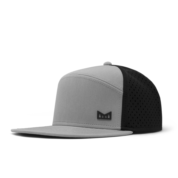 The front, angled view of the melin Trenches Icon Hydro  Horizon Fit in Heather Grey / Black