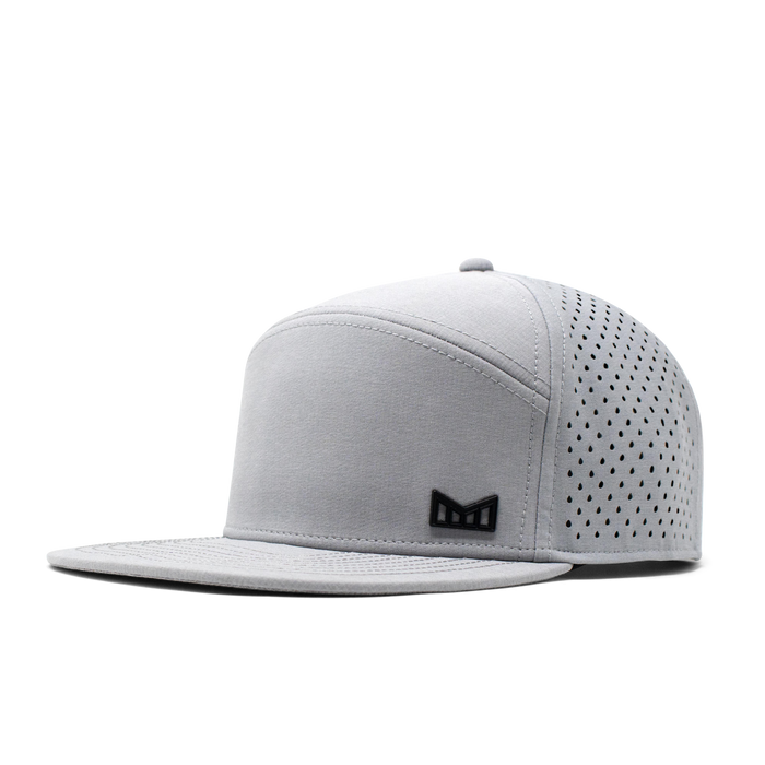 The angled view of the Melin Horizon Fit Treches Icon Hydro hat in white