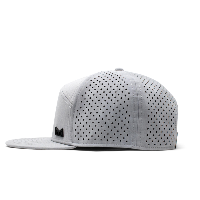 The side view of the Melin Horizon Fit Treches Icon Hydro hat in white
