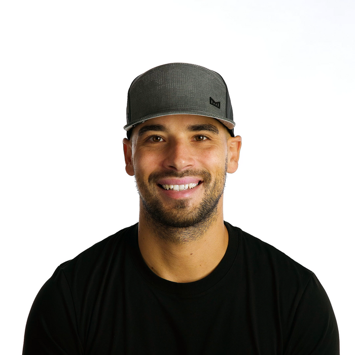 The model-image of the Melin Horizon Fit Trenches Icon Hydro hat in Midnight Reflective