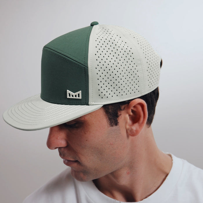 The model-image of the melin Horizon Fit Trenches Icon Hydro hat in misty trails