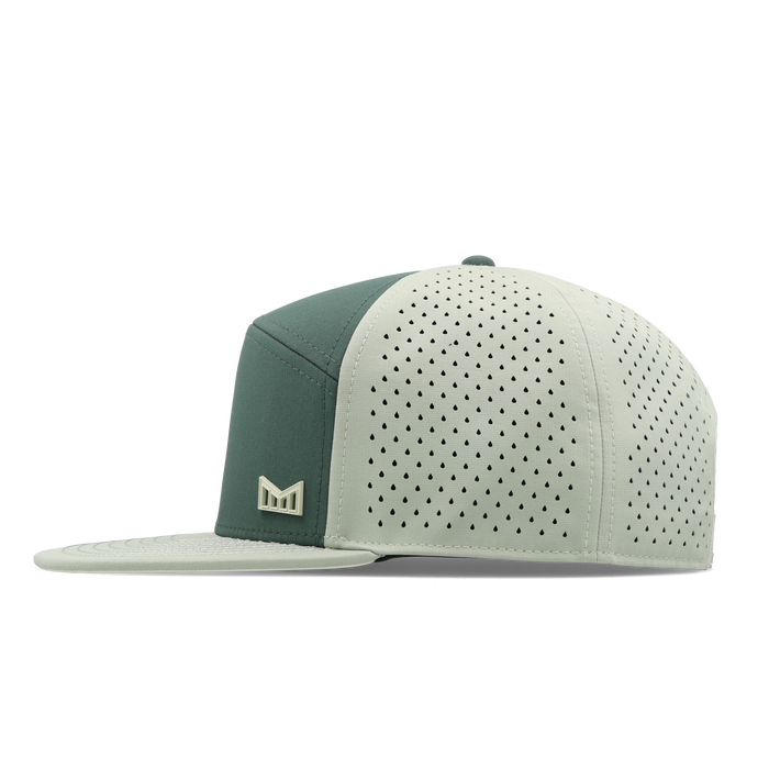 The side view of the melin Horizon Fit Trenches Icon Hydro hat in misty trails