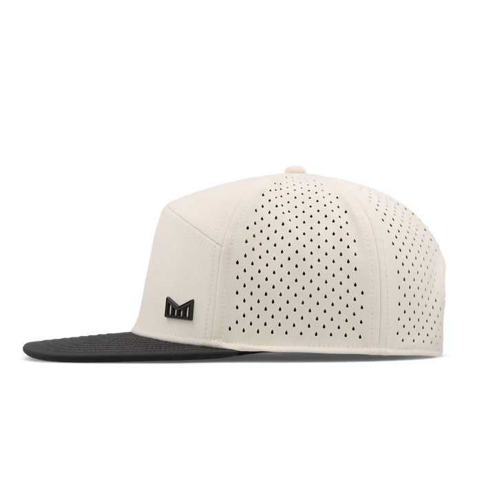The side view of the melin Trenches Icon Hydro Horizon Fit in Moonbeam / Pirate Black