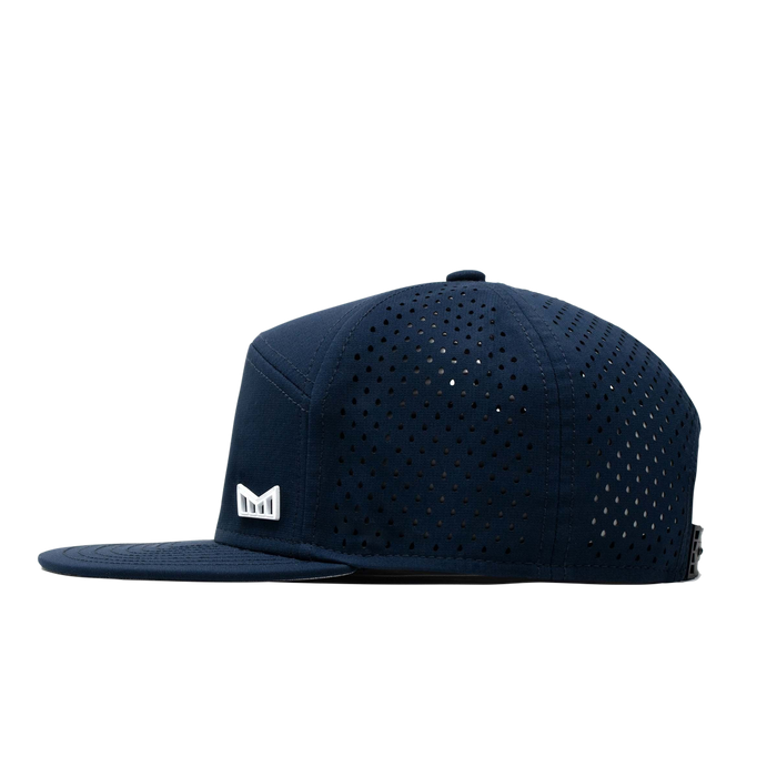 The side view of the Melin Horizon Fit Treches Icon Hydro hat in dark blue