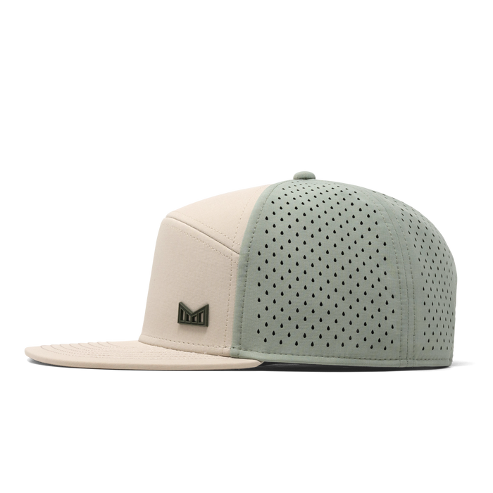 The side view of the melin Trenches Icon Hydro Horizon Fit in Sandshell