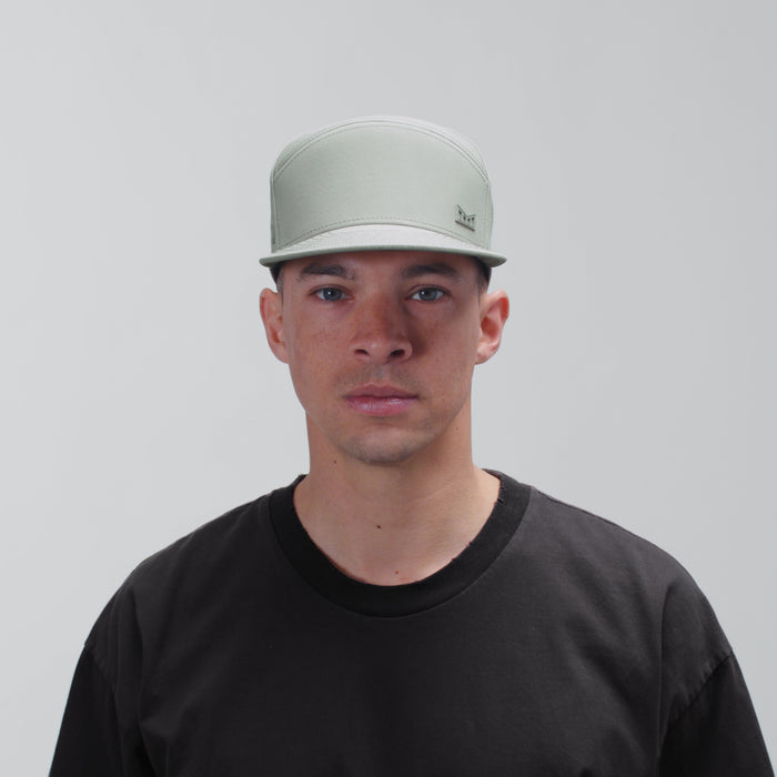 The model-image view of the melin Horizon Fit Trenches Icon Hydro hat in Shadow Sage
